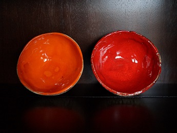 Poland, Red and Orange Ceramic Bowls
